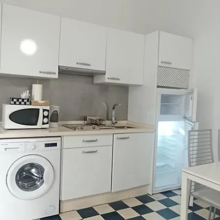Casas Y Patios De *