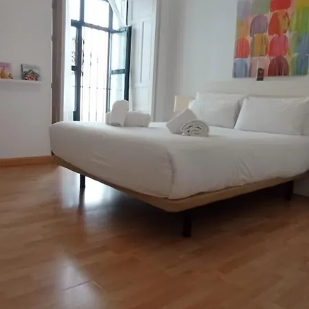 Casas Y Patios De *