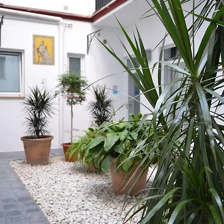 Casas Y Patios De *