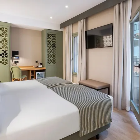 Отель Catalonia Santa Justa 4*